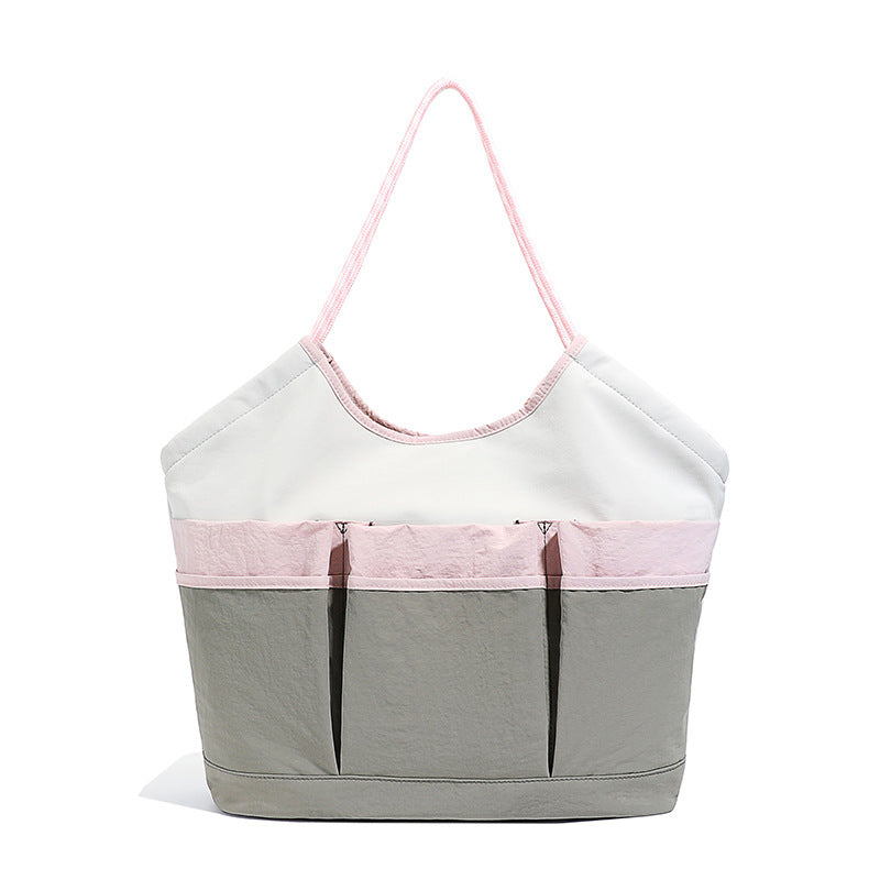 Generous Tote Bag With Multiple Outside Pockets Bowlift