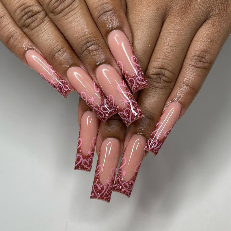 Artistic Press-On Nail Set with Heart and Glitter Design Bowlift
