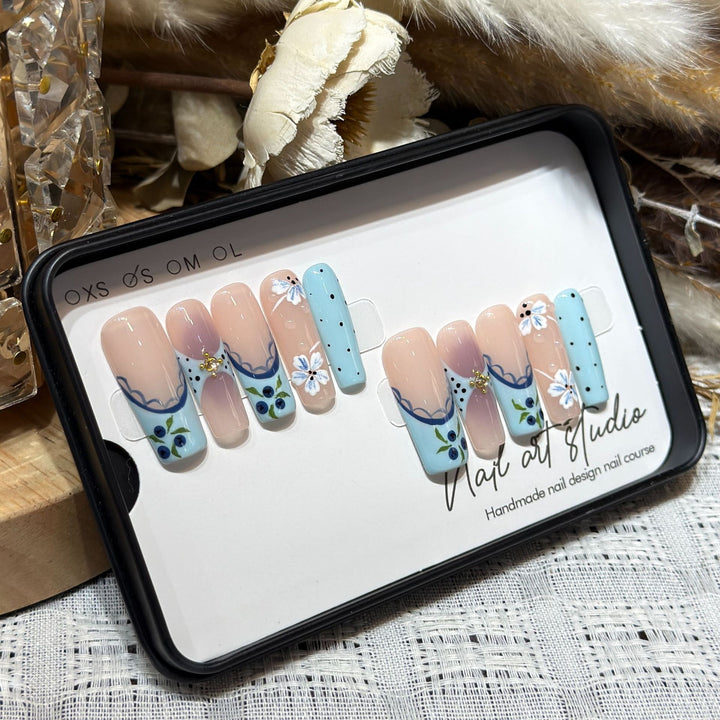 Artistic Press-On Nail Set with Floral and Geometric Design Bowlift