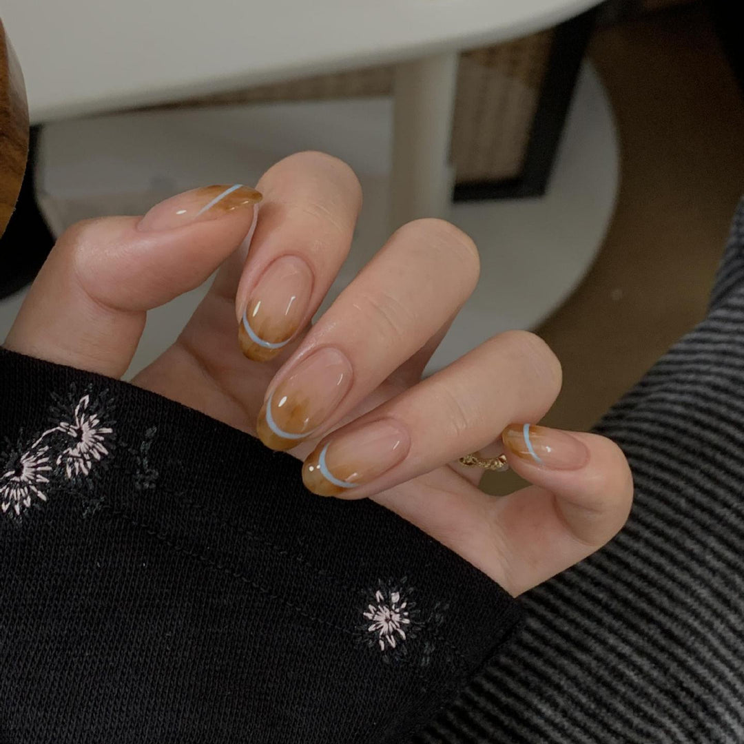 Artificial nails with modern French manicure design Bowlift
