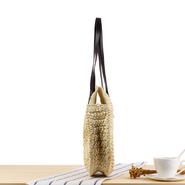Round basket bag with sturdy leather handles Bowlift