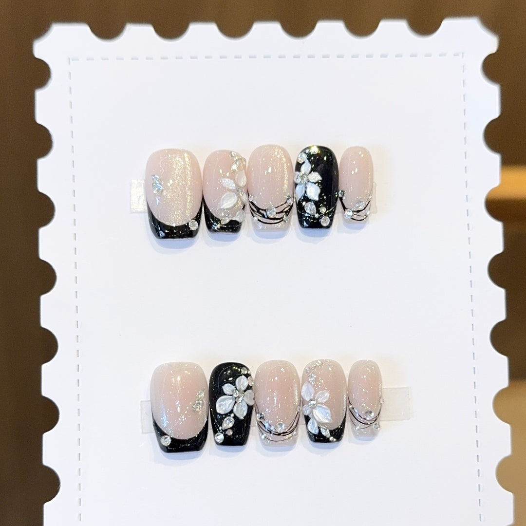 Exclusive artificial nails with floral accents and glitter coating Bowlift