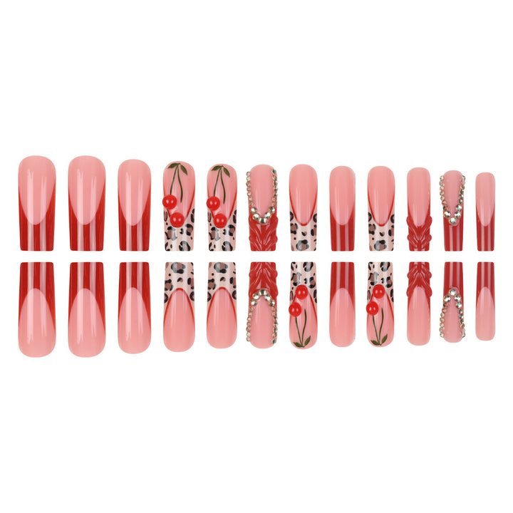 Artistic Long Press-On Nail Extensions with Decorative Accents Bowlift