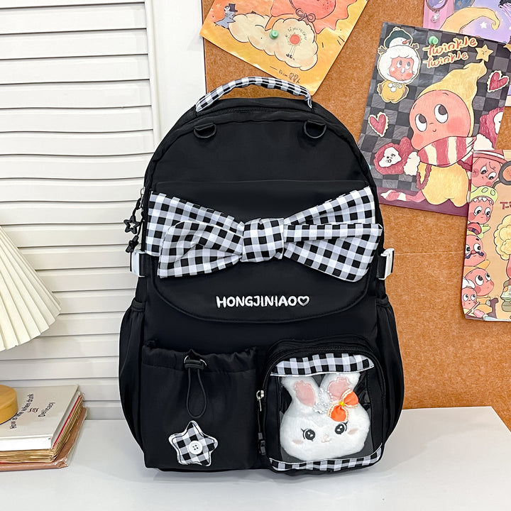 Playful Bow-Embellished Backpack Bowlift