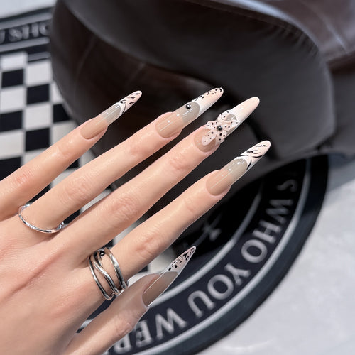 Artistic Stiletto Nail Art Set with Elegant Decorative Elements Bowlift