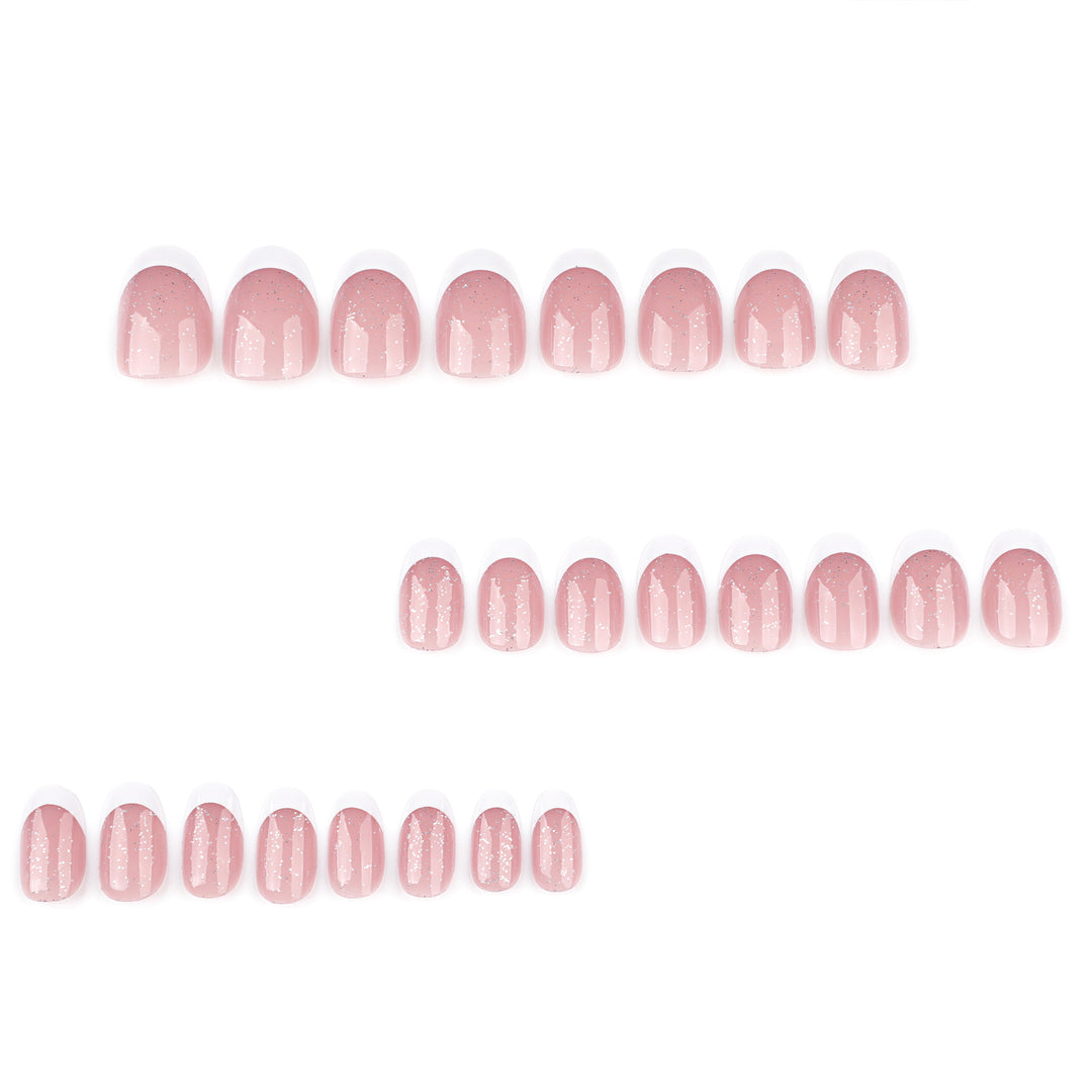 Artful nail art with glitter in gentle tones and elegant tips Bowlift