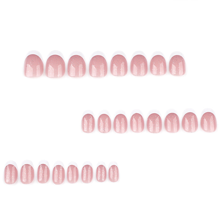 Artful nail art with glitter in gentle tones and elegant tips Bowlift