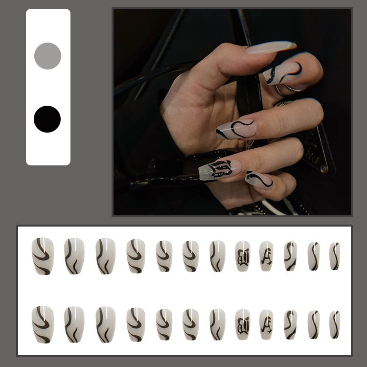 Acrylic nail set with elegant design and creative accents Bowlift