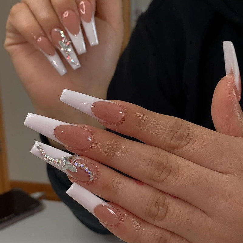 Acrylic nail set with glamorous tips embellishments and elegant accents Bowlift
