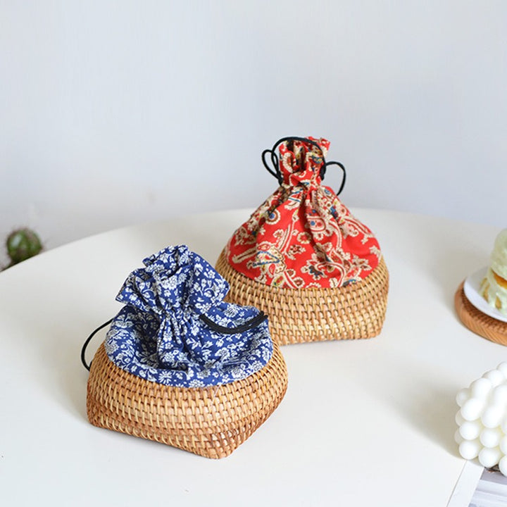 Charming storage bag made of hand-woven rattan Bowlift