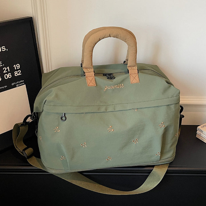 Embroidered Utility Travel Bag