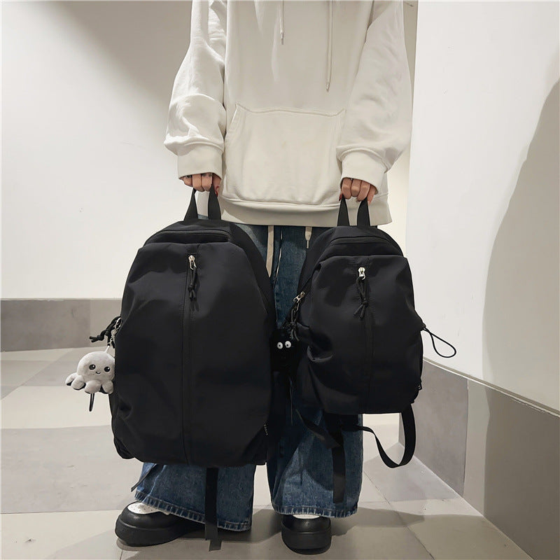 Backpack with Charming Animal Pendant and Innovative Storage Bowlift