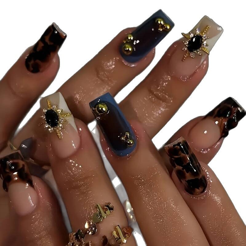 Artistic Patterned Press-On Nail Set with Decorative Elements Bowlift