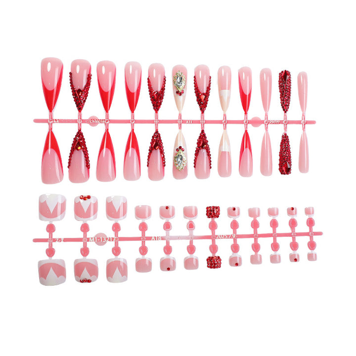 Artificial nail set with sparkling rhinestone accents and romantic motifs Bowlift