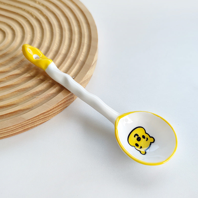 Ceramic soup spoon with lucky cat illustration and ergonomic long-handle Bowlift