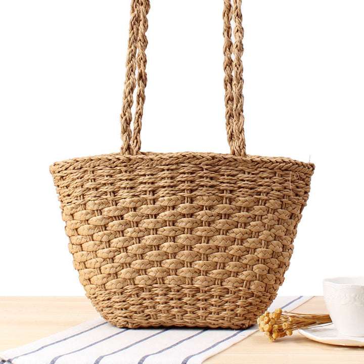Braided handbag made of natural raffia with robust carrying straps Bowlift