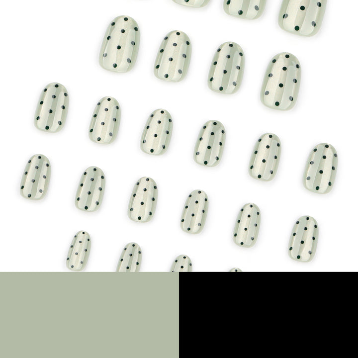 Creative Nail Art with Polka Dot Pattern Bowlift