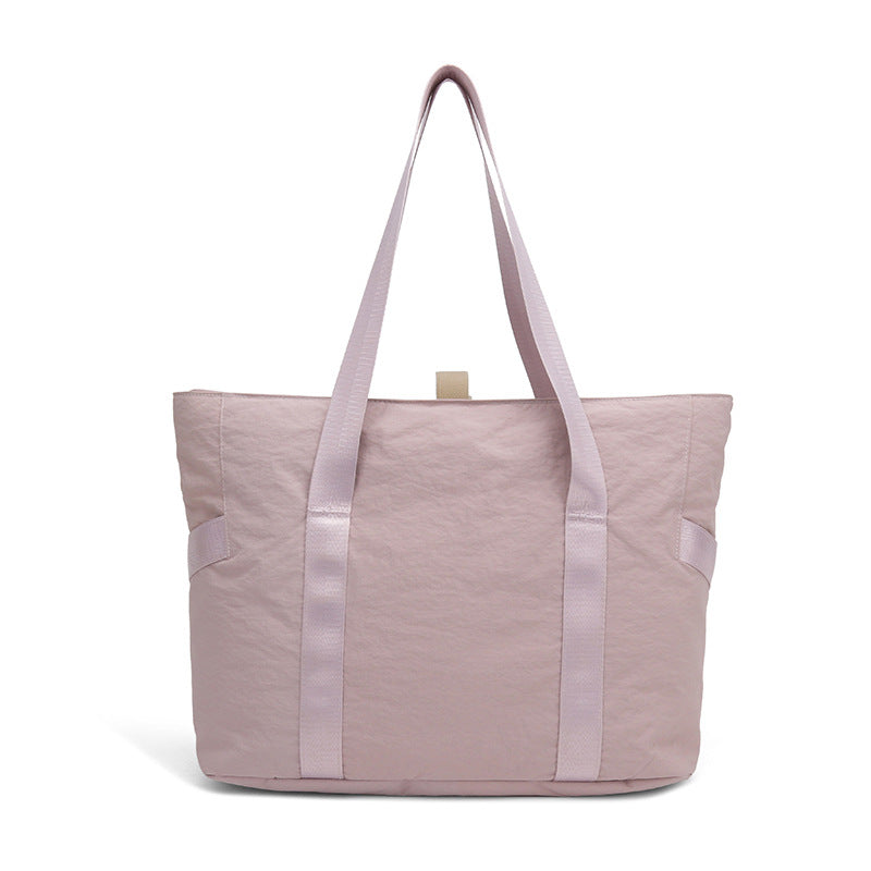 Stylish tote bag with spacious main compartment and reinforced handles Bowlift