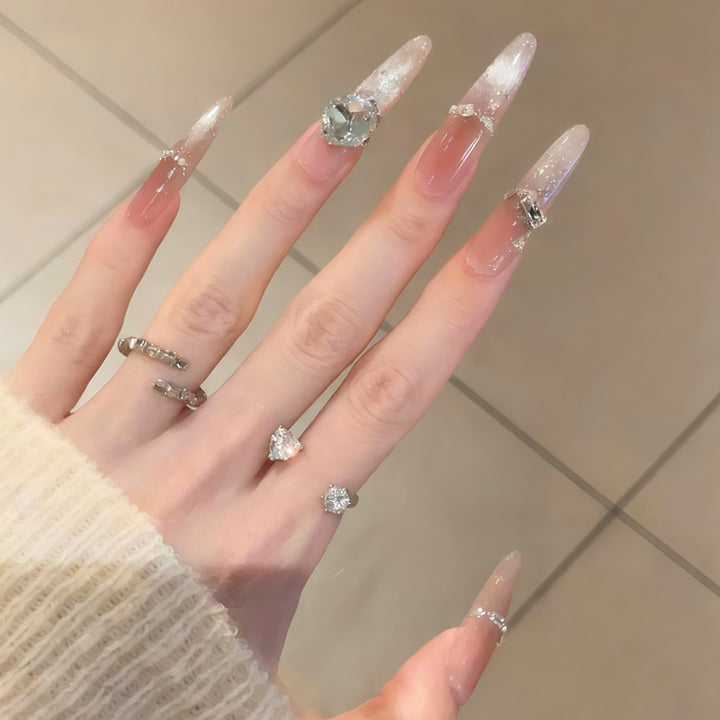 Glamorous artificial nails with crystal accents Bowlift