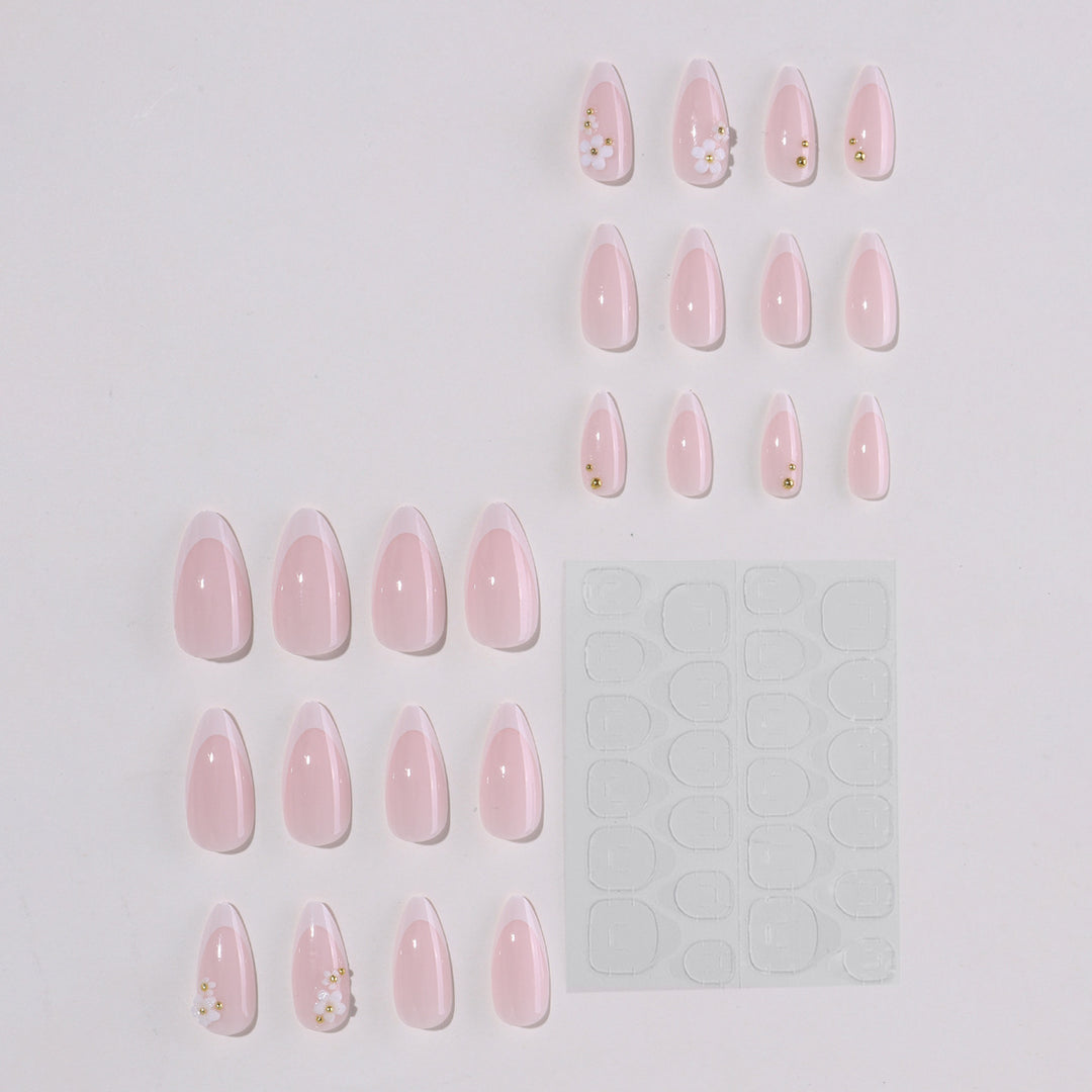 Artificial nail set with elegant floral accents and glitter Bowlift