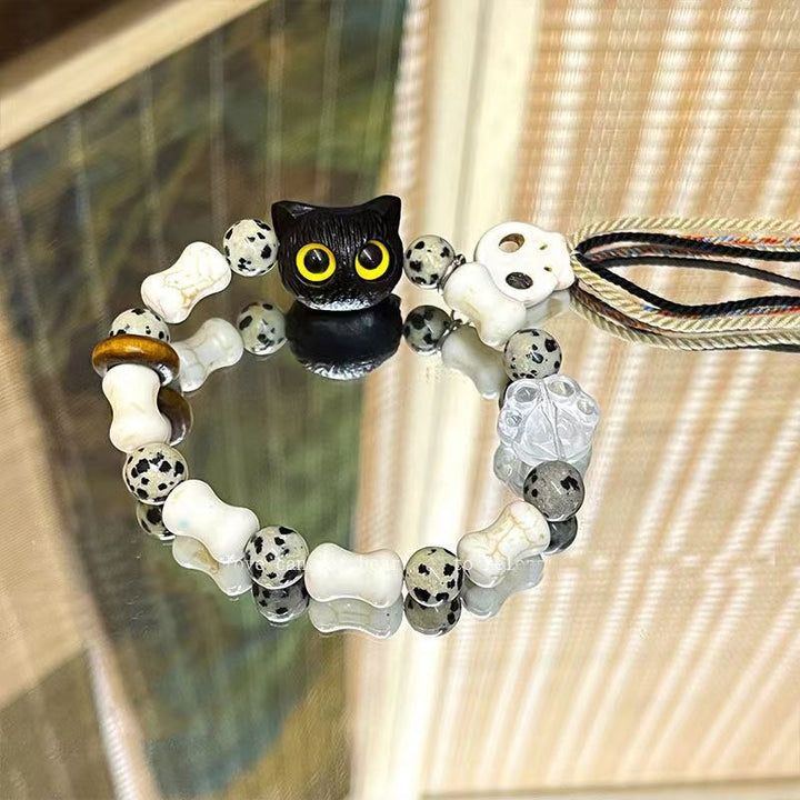 Whimsical Cat and Bone Charm Bracelet Bowlift