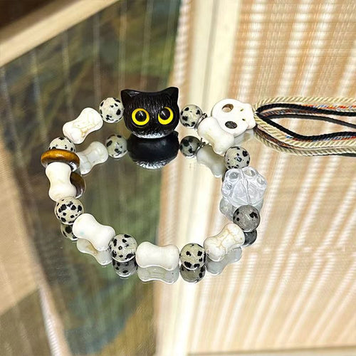 Whimsical Cat and Bone Charm Bracelet Bowlift