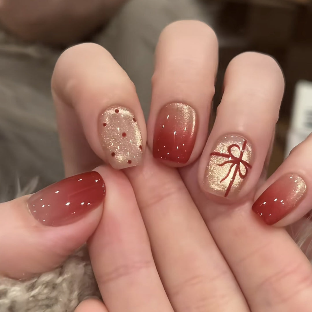 Artificial nails with festive gradient color and elegant decorations Bowlift