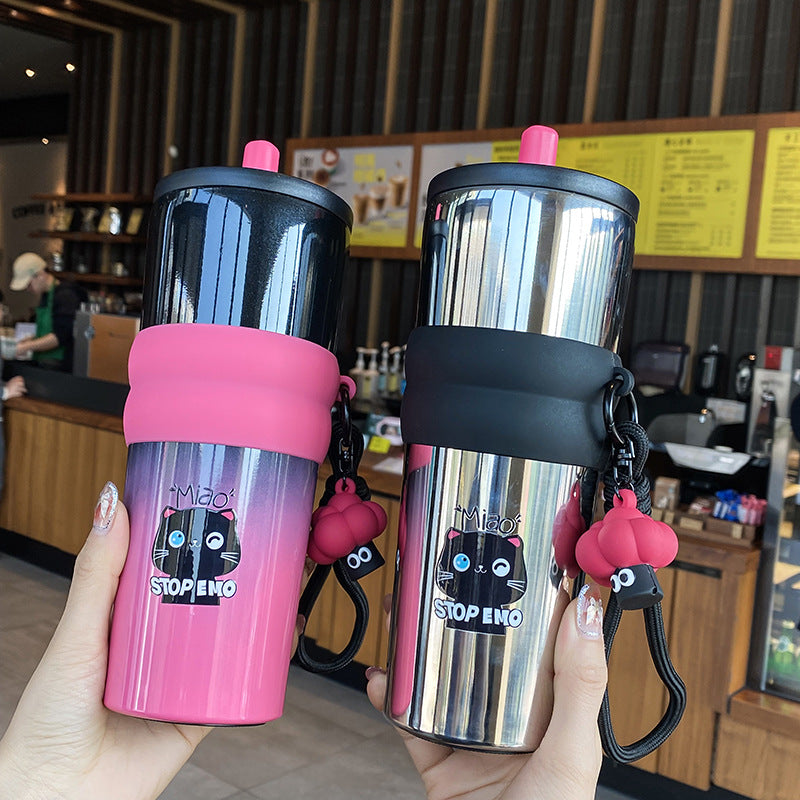 Women's playful coffee mug with silicone sleeve and integrated pendant Bowlift