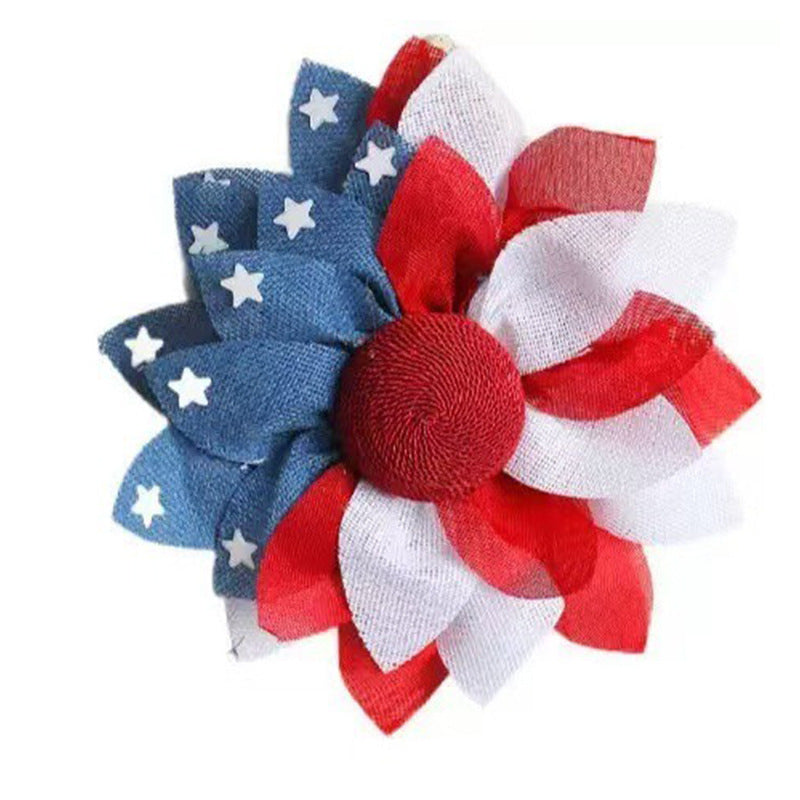 Unisex decorative door wreath with layered fabric bows and star appliqués Bowlift