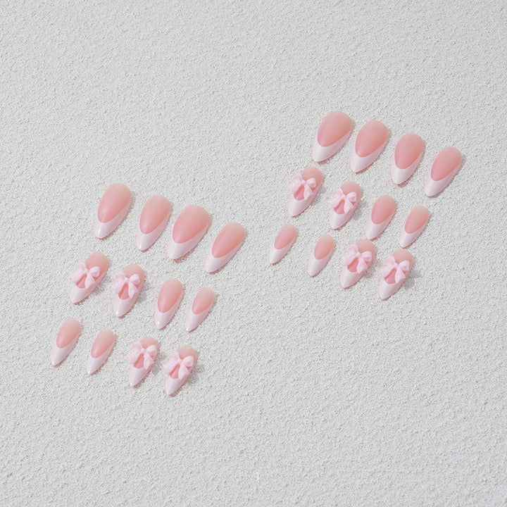 Nail art set with playful bow accents Bowlift