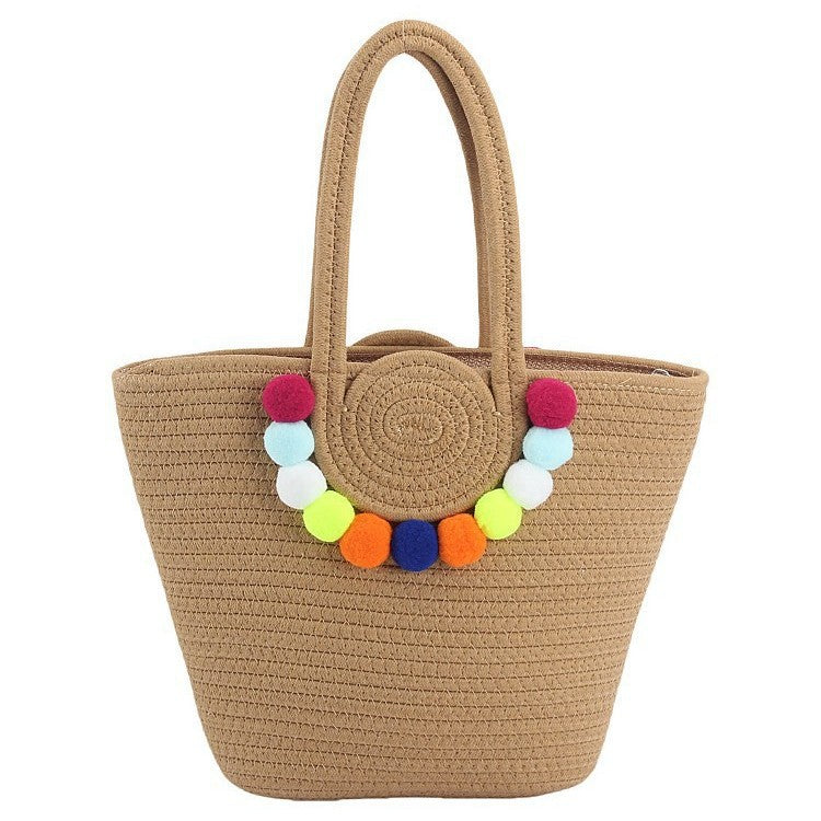 Beach bag with cheerful pom poms Bowlift
