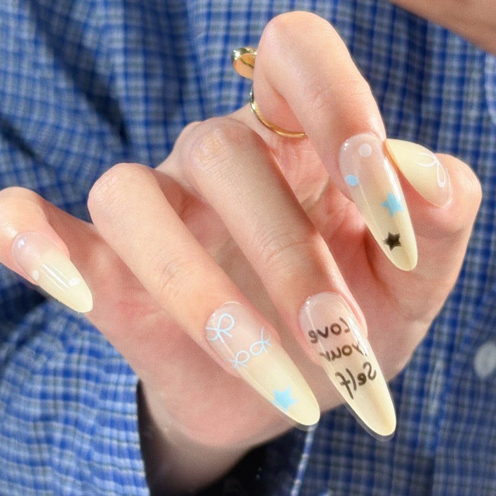 Artistic Press-On Nail Set with Floral and Glossy Accents Bowlift