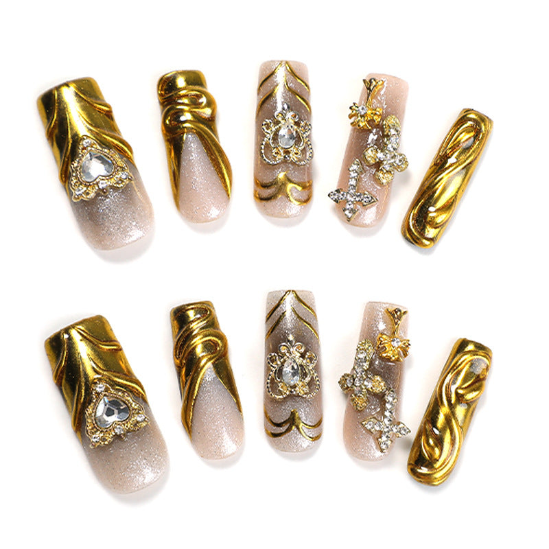 Artificial nail set with luxurious gold embellishments Bowlift