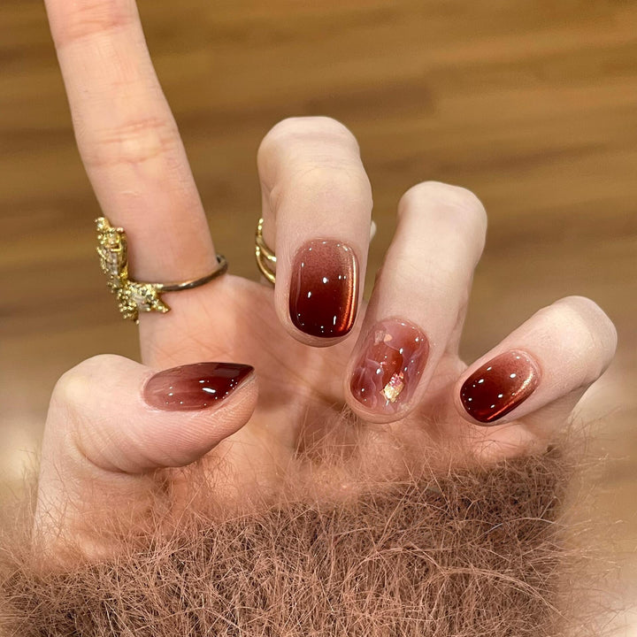 Artificial nails with elegant gradient and golden accents Bowlift