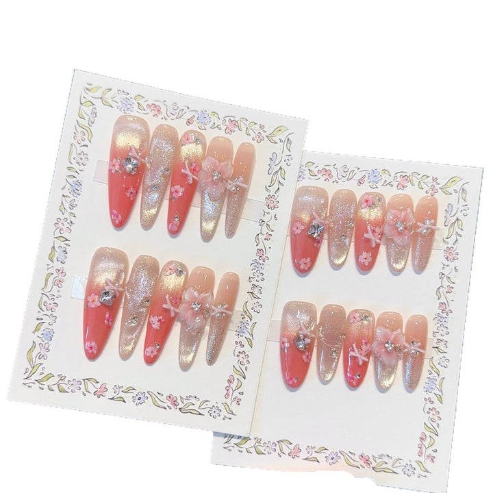 Artificial nails with floral embellishments and glitter effects Bowlift