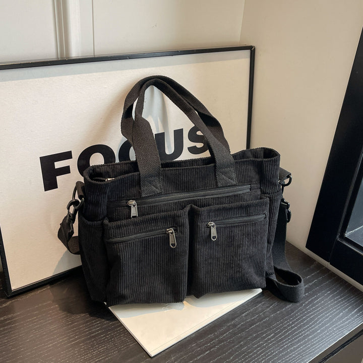 Durable shoulder bag with multiple compartments Bowlift