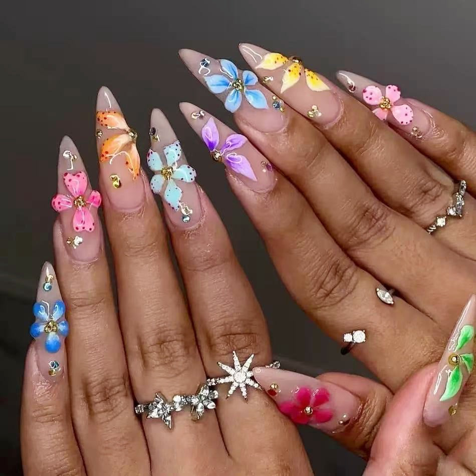 Artificial nail tips with floral decorations Bowlift