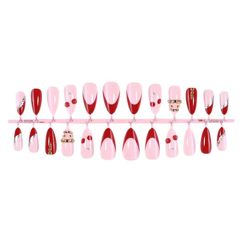 Decorative Art Press-On Nail Set with Cherry and Gold Accents Bowlift