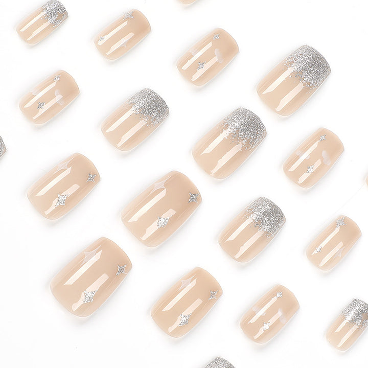 Glittering nail extensions with creative jewelry design Bowlift