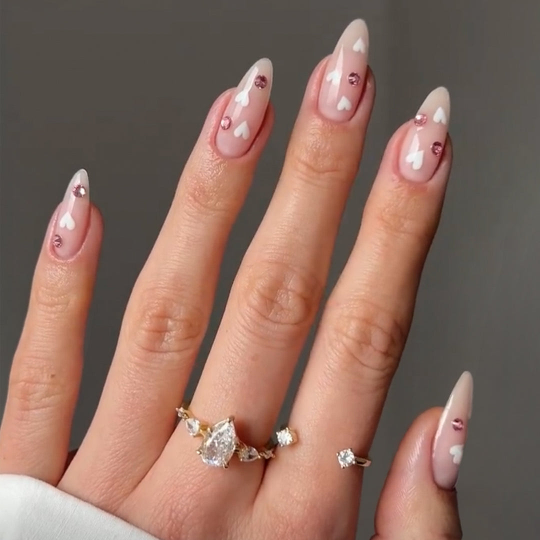 Decorative artificial nails with heart motif and rhinestones Bowlift