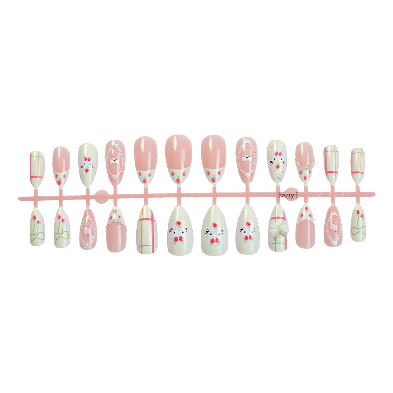 Decorative Press-On Nail Set with Floral and Whimsical Designs Bowlift