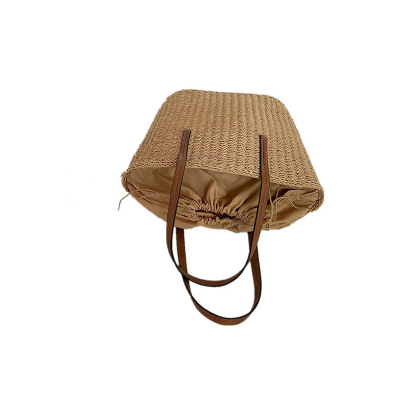 Spacious straw bag with sustainable leather handles Bowlift