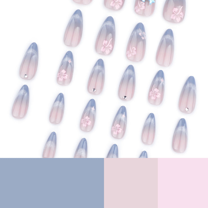 Artful nail extensions with elegant ombré design and floral accents Bowlift