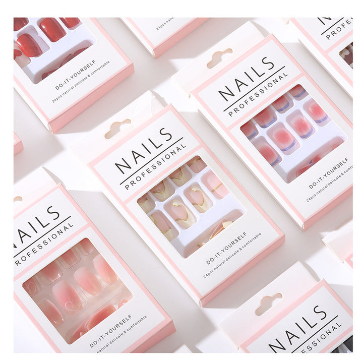 Artificial nail set with elegant stiletto design and glossy accents Bowlift