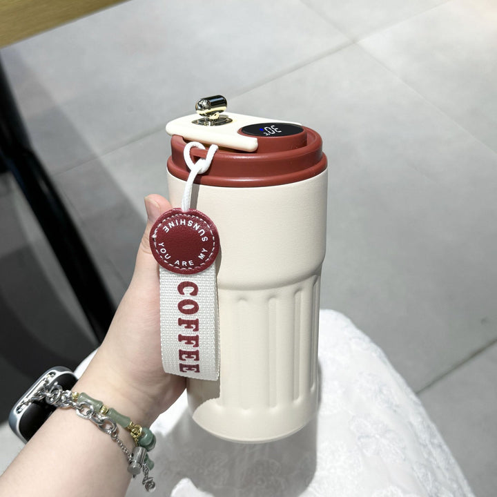 Ladies insulated cup with practical carrying strap Bowlift