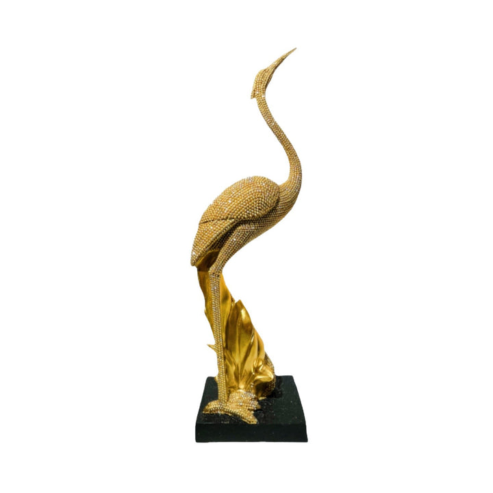 Shiny parrot figure on tree stump Bowlift