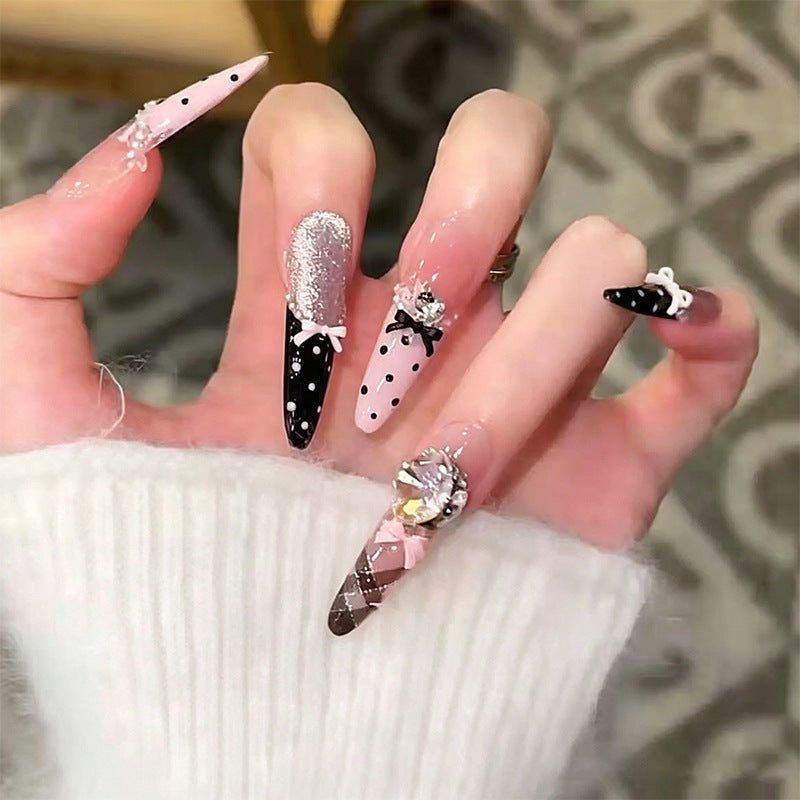 Artificial nail set with sparkling glitter accents Bowlift