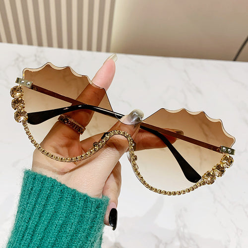 Women's extravagant sunglasses with sparkling accent and unique design Bowlift