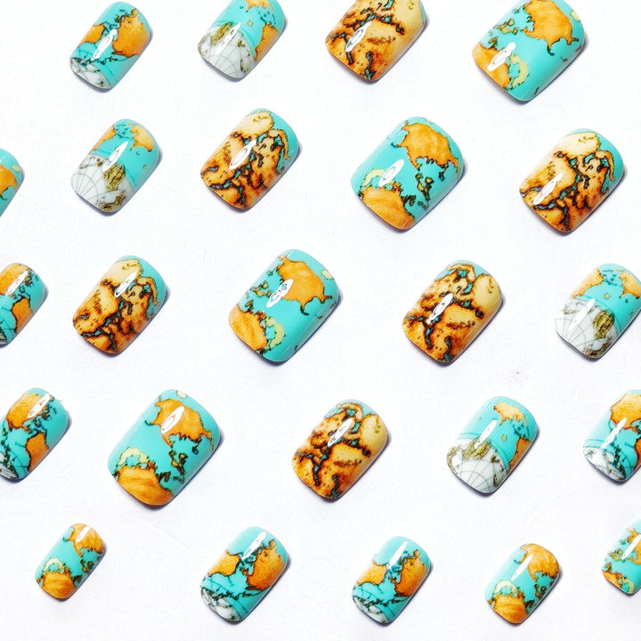Creative artificial nails with world map inspired design Bowlift