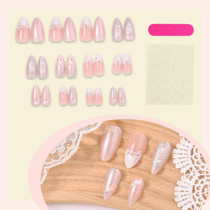 Acrylic nail set with elegant floral and glitter motifs Bowlift